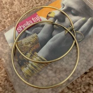 Sheila Fajl thin gold hoops